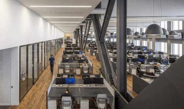 Virtu Financial traders at multi-monitor desks
